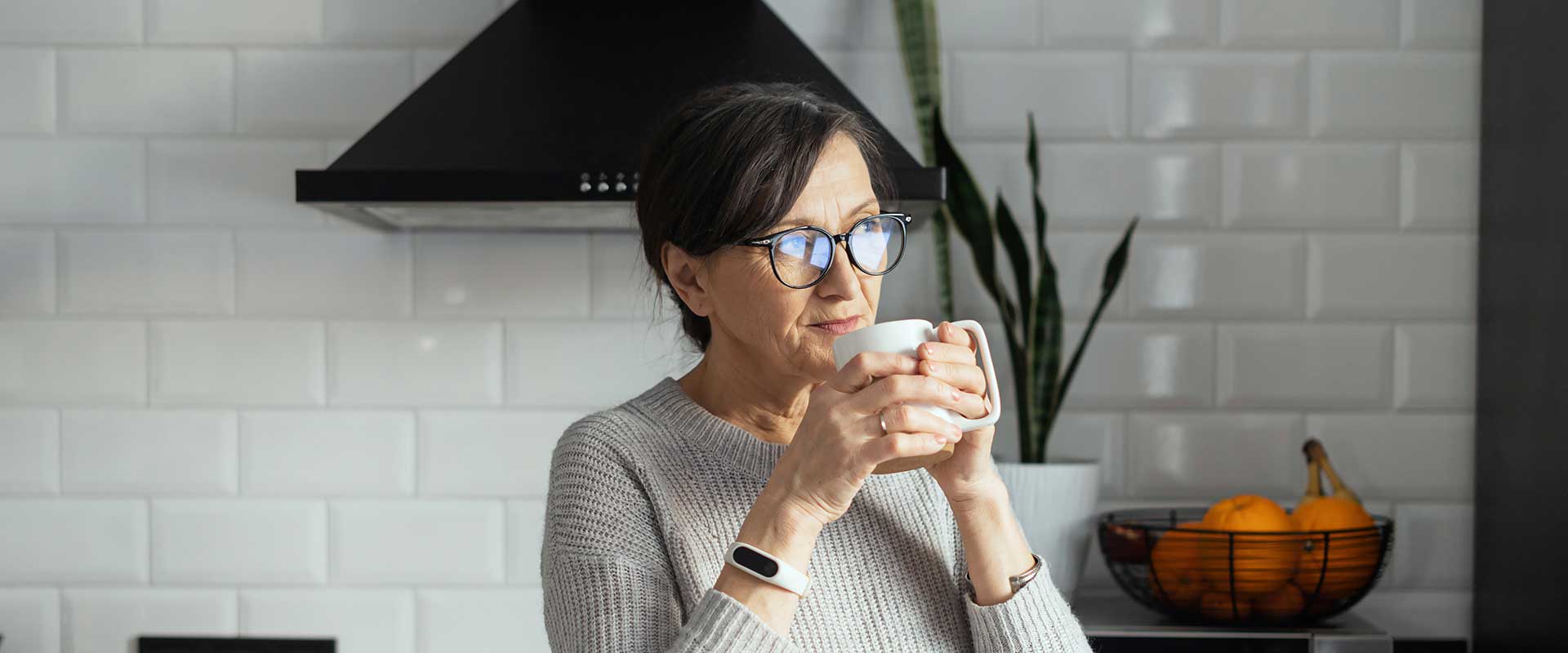 Woman drinking from a mug