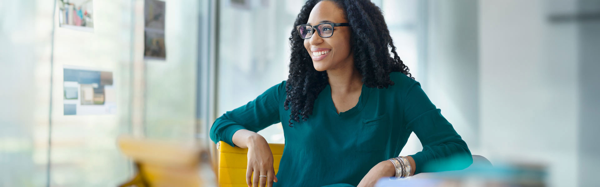 Casual woman smiling in office setting