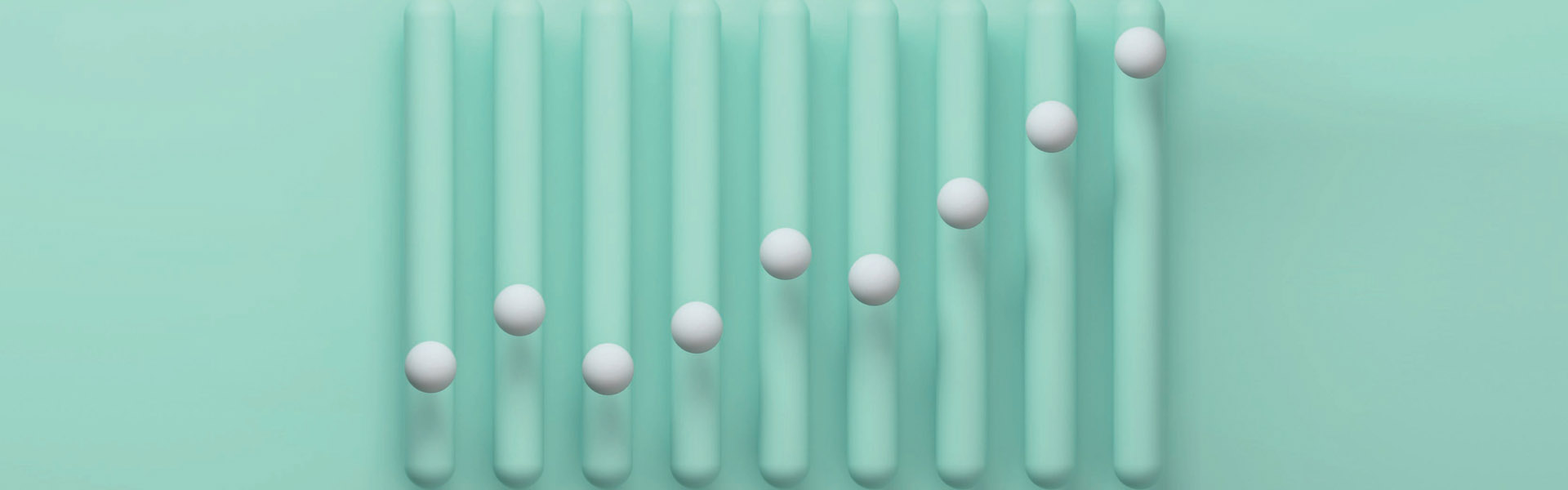 Nine green tubes with a white sphere inside each, floating at various levels to form points on a graph.