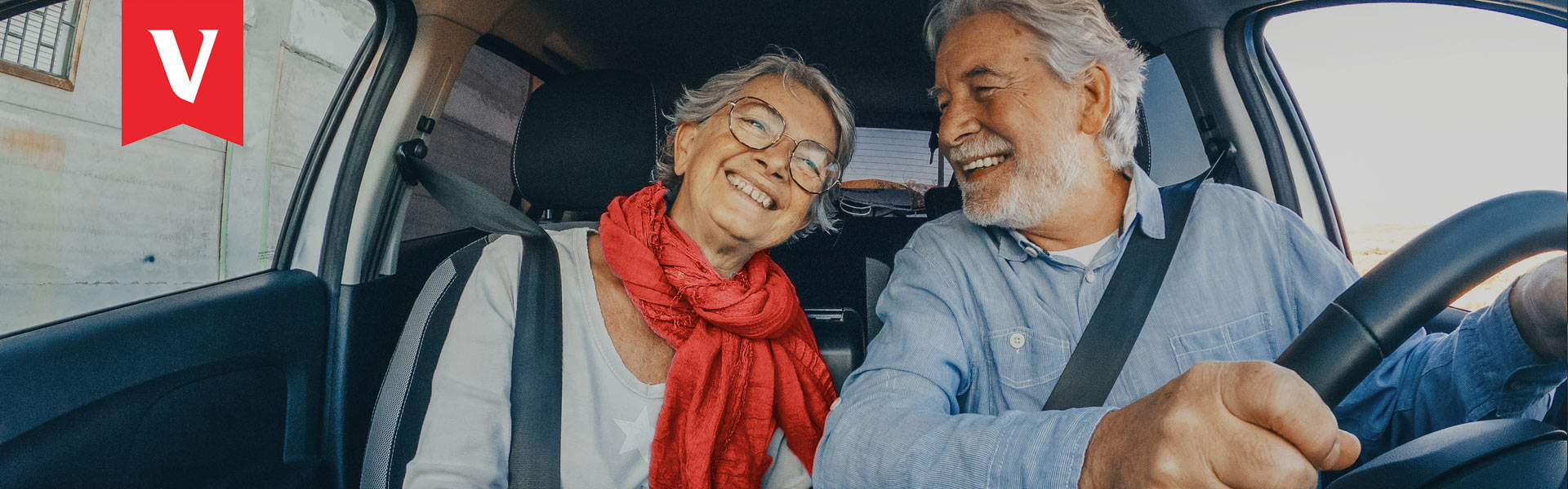 A couple driving in a car
