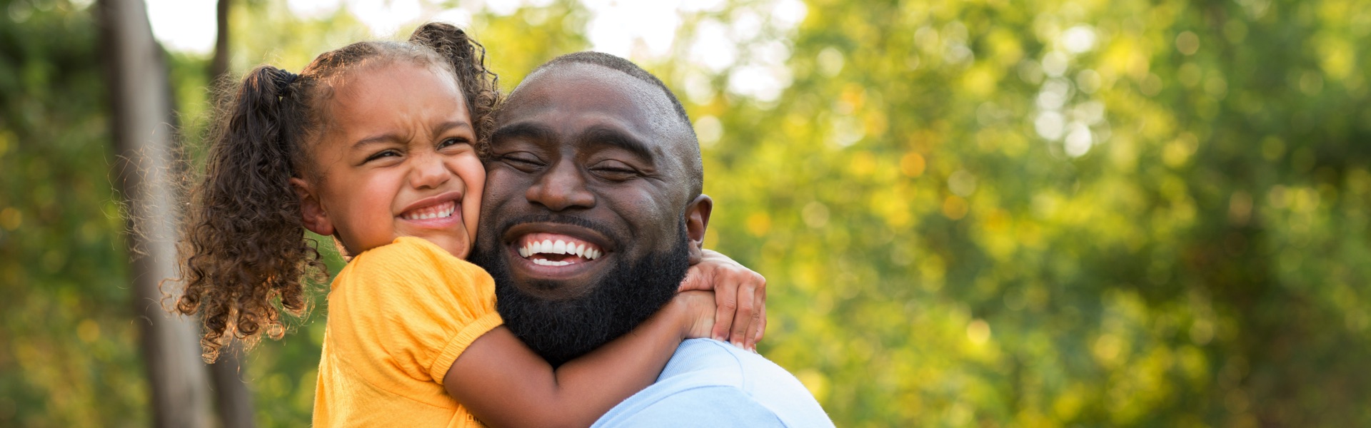 Image of daughter and father hugging