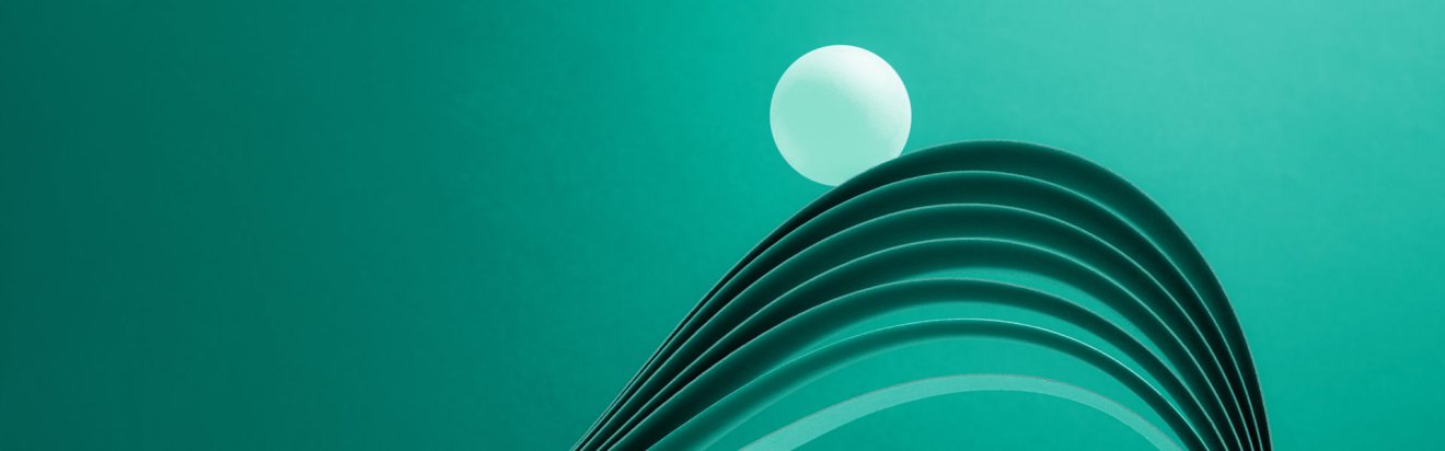 Sphere riding paper waves