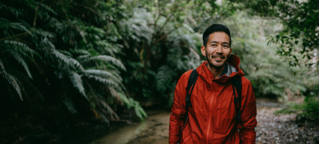 Man walking through the woods