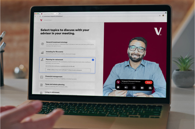 A computer screen displays an advisor on a video call.
