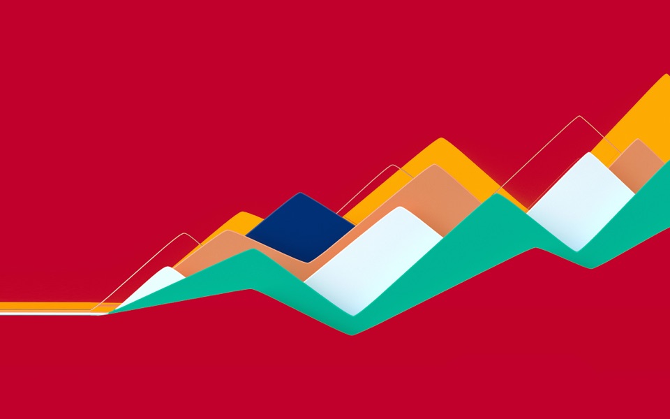 A wide variety of colored triangles against a red background.