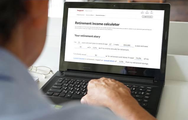 Retirement income calculator on laptop screen.