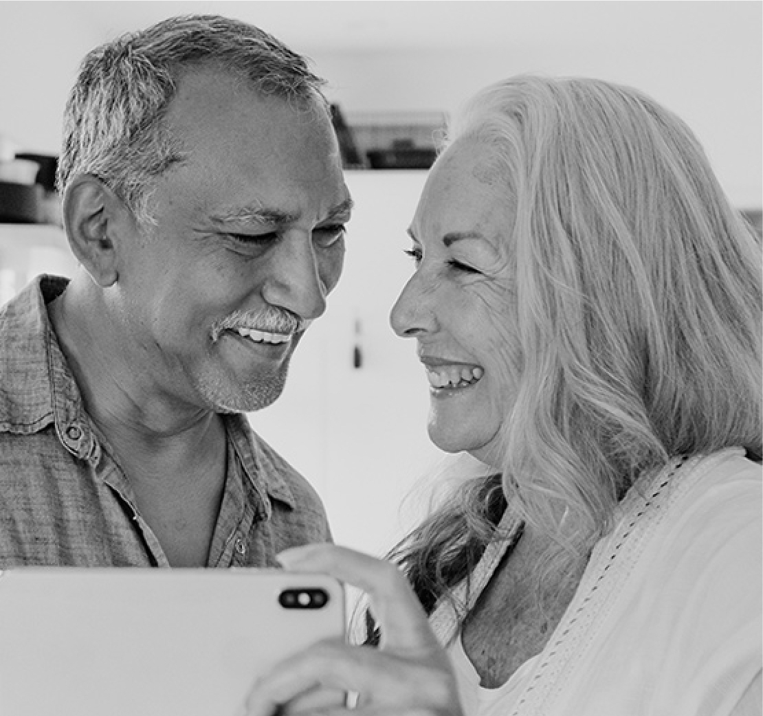 Retired couple enjoying their time together confident their savings will last because their personal advisor has helped them put together a retirement withdrawal strategy.